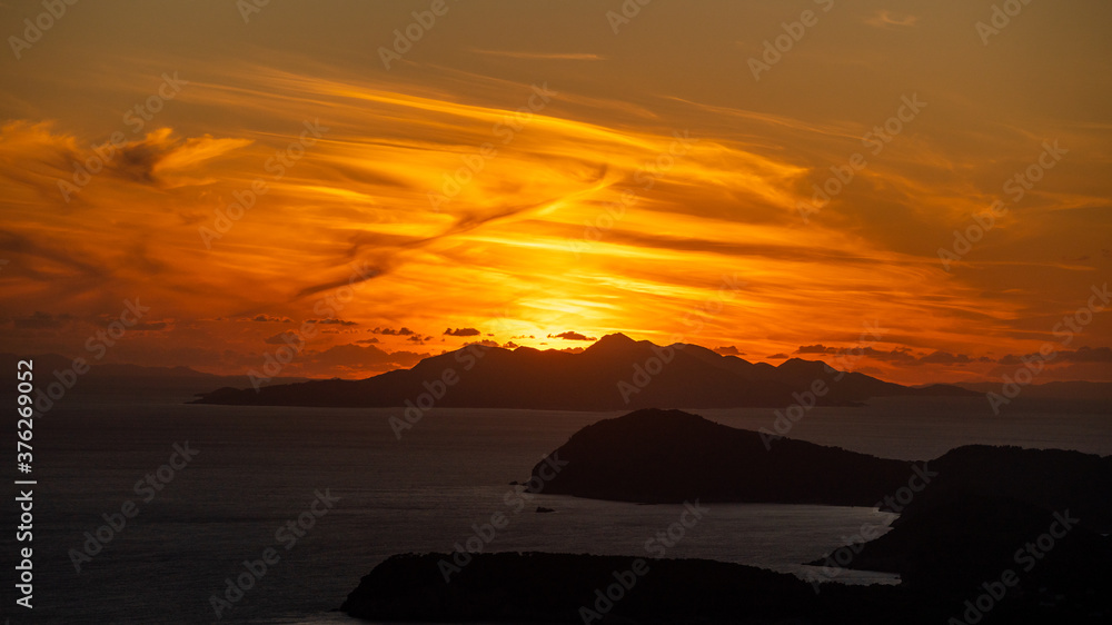 Dramatic sunset over the islands next to dubrovnik