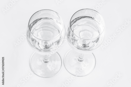 Two glasses on a white background.