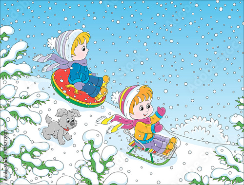 Small children sledding down a snow hill in a snow-covered winter park, vector cartoon illustration