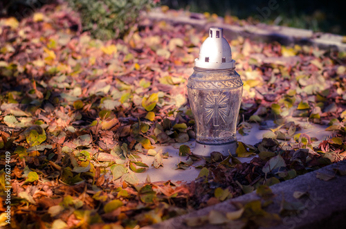 All Saints Day concept in the cemetery