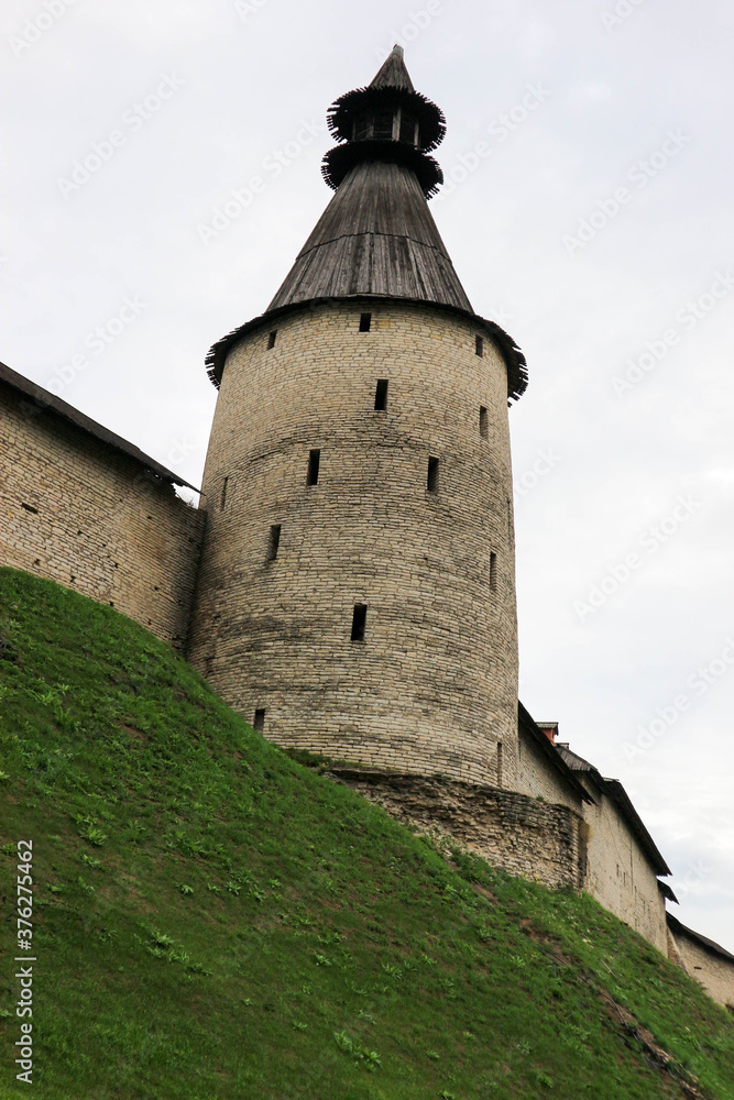 The middle tower with wooden roof of Pskov kremlin (krom) medieval fortress, famous landmark of Russia