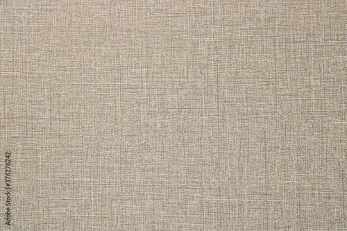 Texture of natural weave cloth in gray color. Fabric texture of natural cotton or linen textile material. Gray fabric background.