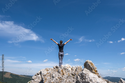 young woman on the mountain