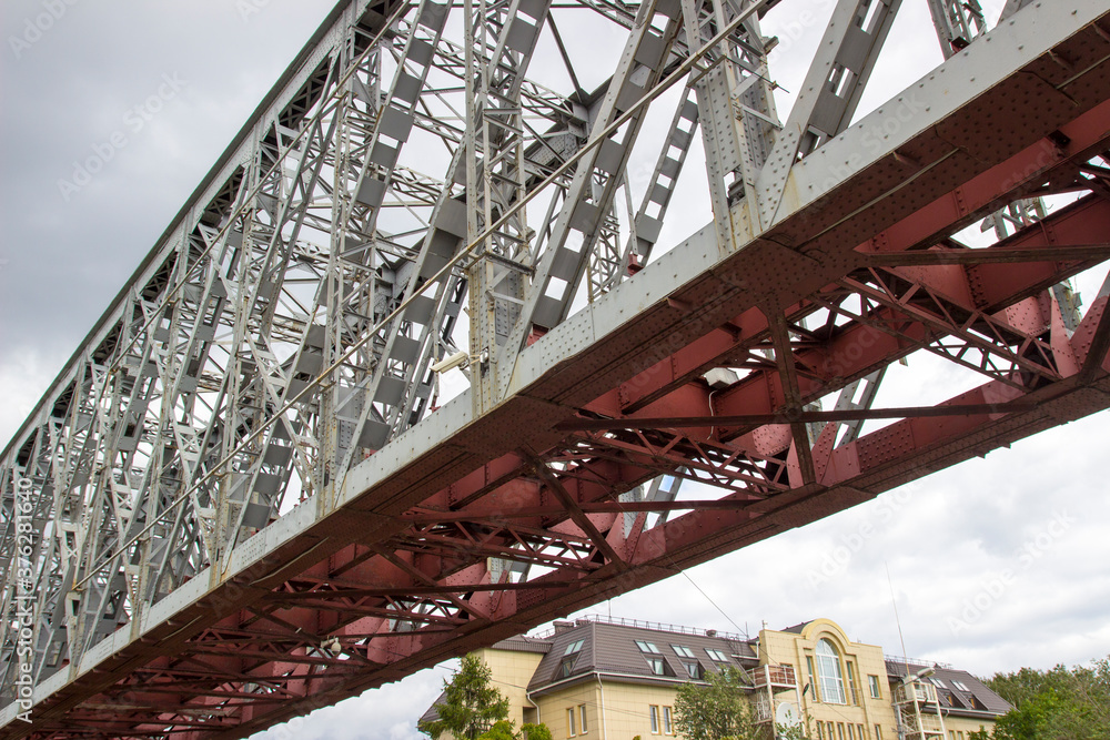 Fototapeta premium Metal section of the railway bridge. Railway Bridge. Fragment of the first railway bridge across the Ob River