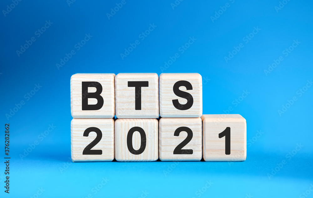 BTS 2021 years on wooden cubes on a blue background BTS 2021 years on wooden cubes on a blue background