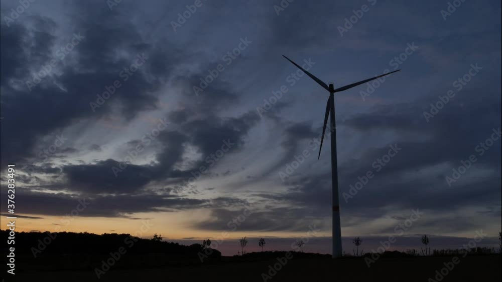 Time Lapse of Wind Turbine at sunset,in the Countryside Time Lapse of Wind Turbine at sunset,in the Countryside