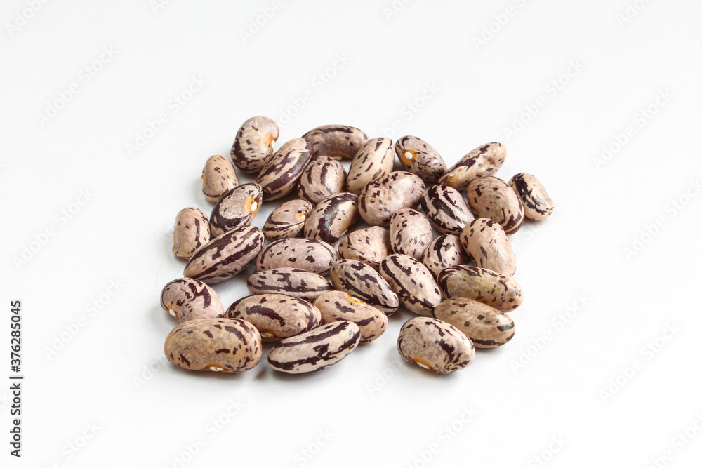 Handful of colorful kidney beans isolated on white background. Group of seeds Handful of colorful kidney beans isolated on white background. Group of seeds