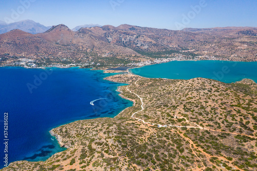 Aerial view of the rugged coastline of Crete and the clear waters of the Aegean Sea (Elounda, Greece) © whitcomberd