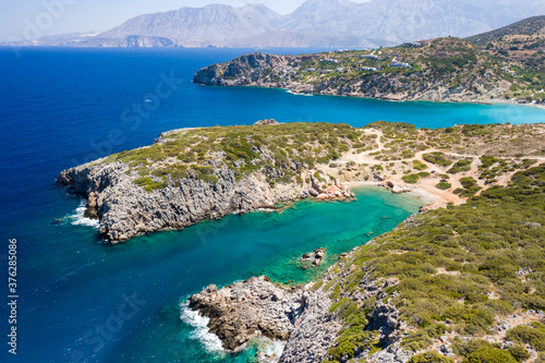 Aerial view of the rocky coastline and Aegean Sea near Voulisma, Crete, Greece