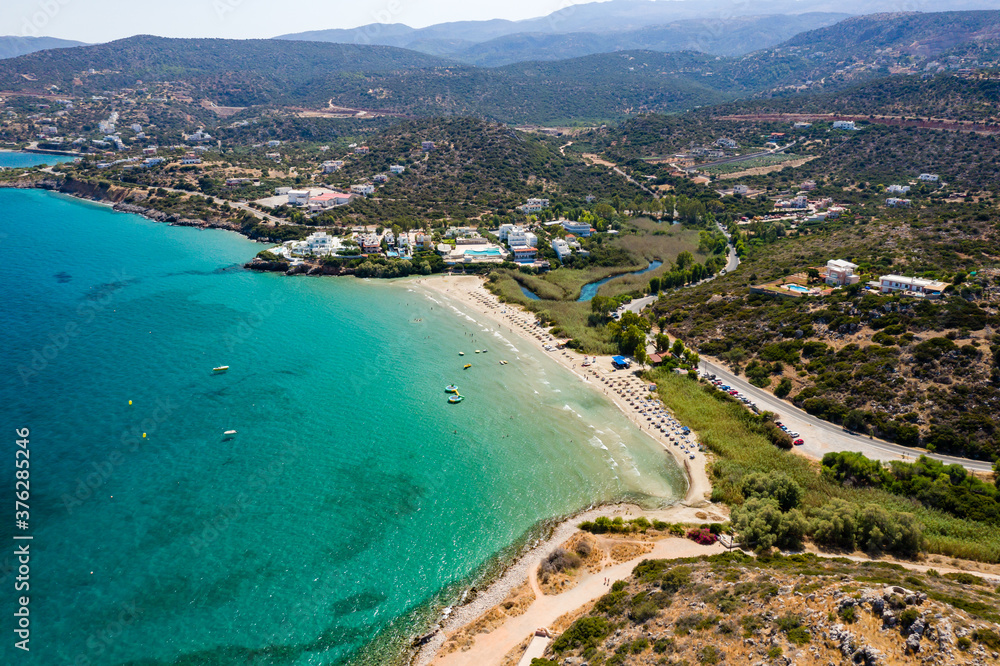 Aerial view of Almyros beach near the town of Agios Nikolaos in Crete, Greece