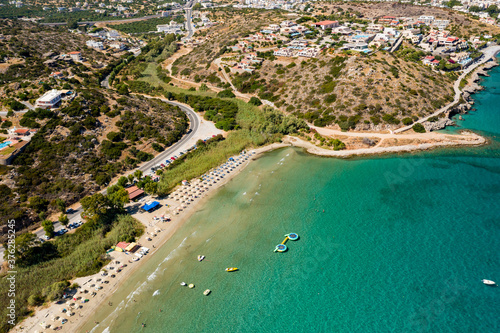 Aerial view of Almyros beach near the town of Agios Nikolaos in Crete, Greece © whitcomberd