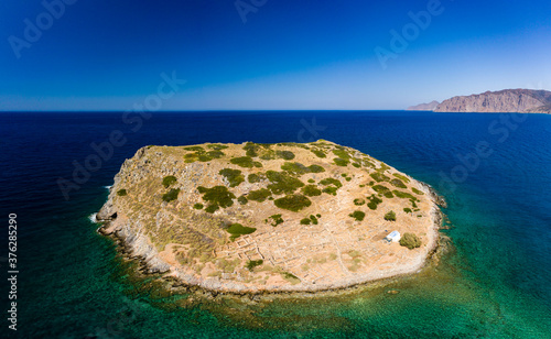 Aerial drone view of the ancient Minoan ruins on the island of Mochlos in Crete, Greece photo