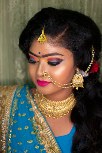 an indian girl in reception party makeup