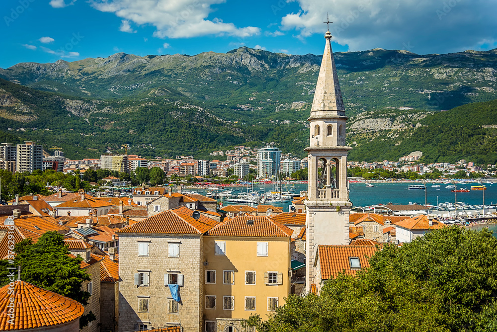 View towards the new town of Budva, Montenegro from the citadel with the bell tower (Sahat Kula) in the foreground