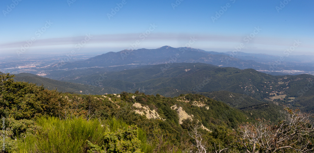 aerial view panorama of a motorway through the Spanish border and the mountains