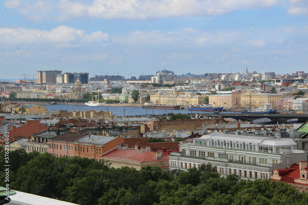 Beautiful view of St. Petersburg. Neva river and old colored buildings.