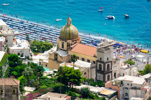 Italy, Campania, Positano - 17 August 2019 - View of the church of Positano and the surrounding buildings