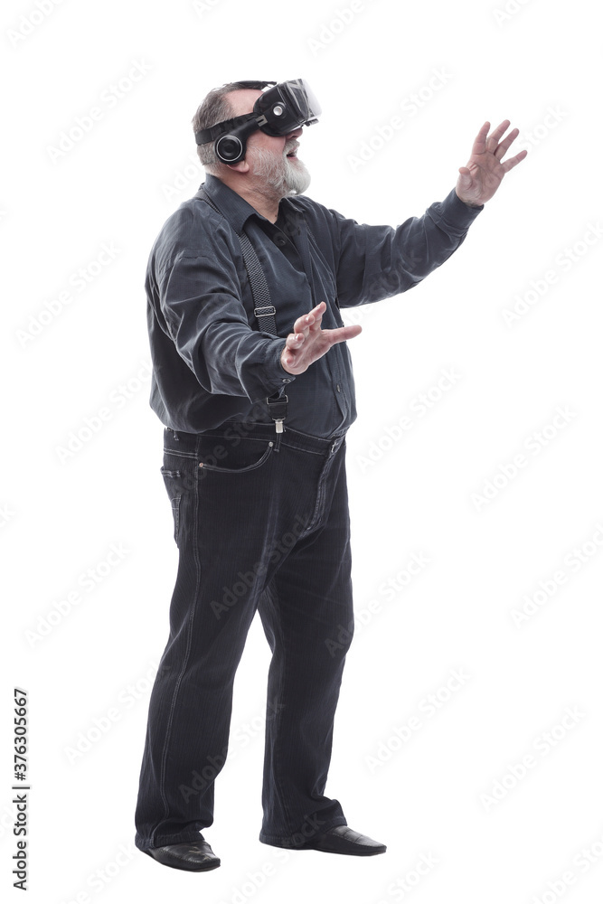 modern adult male in a virtual reality helmet. isolated on a white modern adult male in a virtual reality helmet. isolated on a white