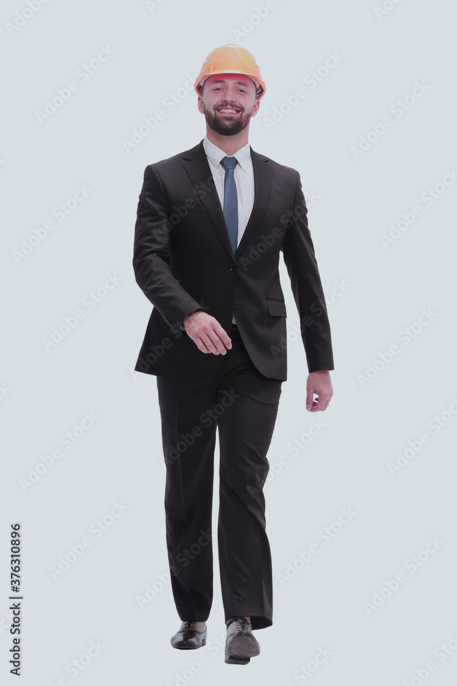 in full growth. businessman in a helmet going forward in full growth. businessman in a helmet going forward