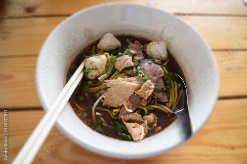 Local Thai style noodles pork soup photo