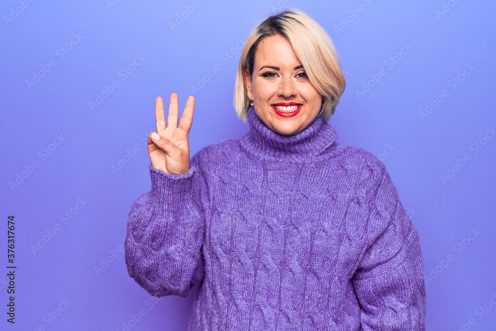 Beautiful blonde plus size woman wearing casual turtleneck sweater over purple background showing and pointing up with fingers number three while smiling confident and happy. Beautiful blonde plus size woman wearing casual turtleneck sweater over purple background showing and pointing up with fingers number three while smiling confident and happy.