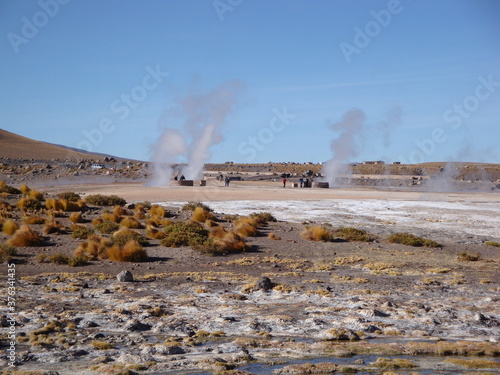 Thermal Geysers in the Atacama Desert, Chile, people bathing in thermal pools photo