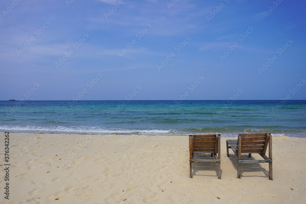 Benches on the tioman island beach. Tioman Island lies off the east coast of Peninsular Malaysia, in the South China Sea.