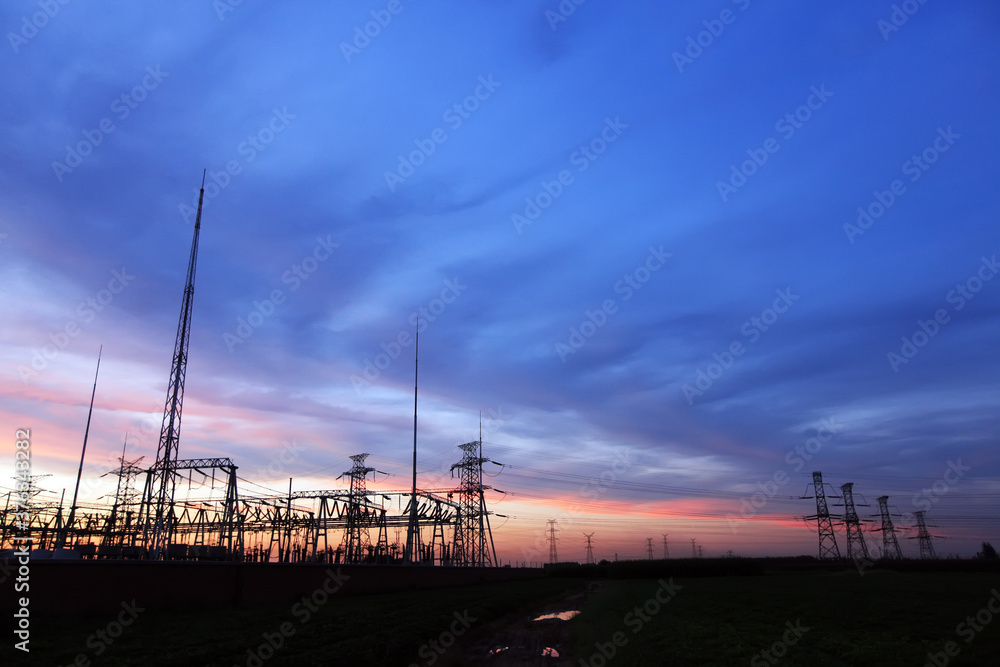  substations and high-voltage pylons in the evening