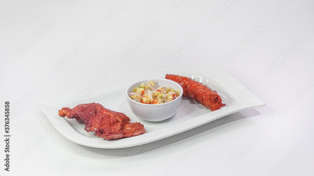 Tacacho con chorizo, cecina y ají de cocona Tacacho con chorizo, cecina y ají de cocona