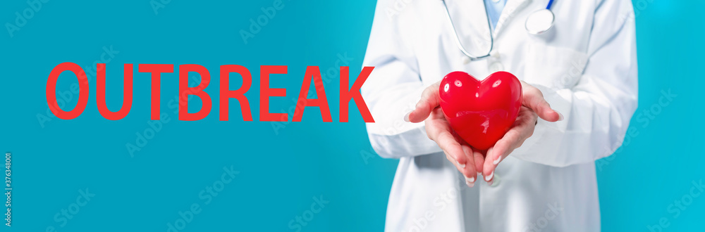 Outbreak theme with a doctor holding a heart on a blue background Outbreak theme with a doctor holding a heart on a blue background