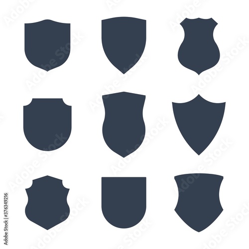 Shield shape or police emblem black silhouettes set vector illustration isolated.