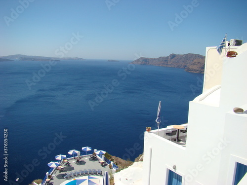 Fototapeta Naklejka Na Ścianę i Meble -  Santorini Greece, White Blue Buildings, Aegean Sea, Clear sky