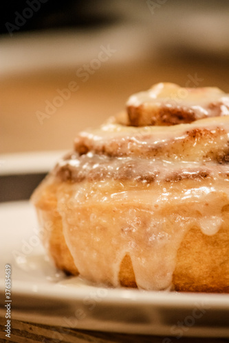 Delicious hot cinnamon roll with icing