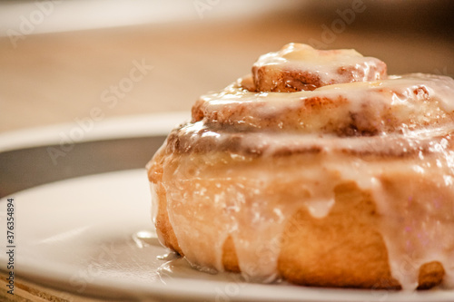 Delicious hot cinnamon roll with icing