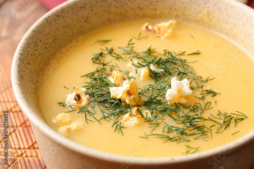 Creamy yellow soup with fre...