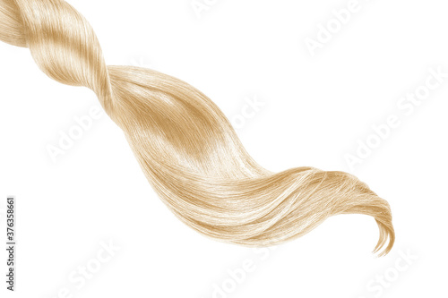 Blond shiny hair on white background, isolated