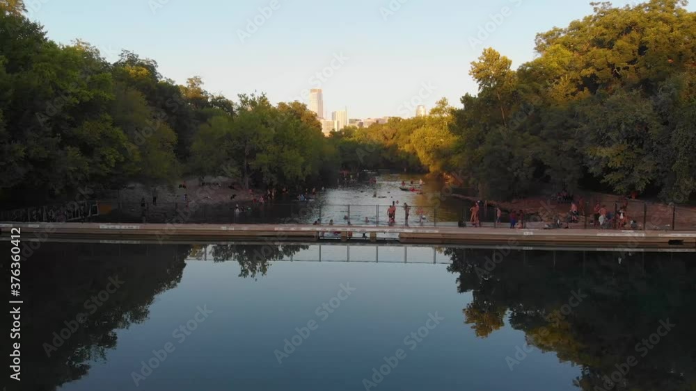 Vertigo shot of barton springs pool over to barking springs spillway. Austin Texas August 2020 Vertigo shot of barton springs pool over to barking springs spillway. Austin Texas August 2020