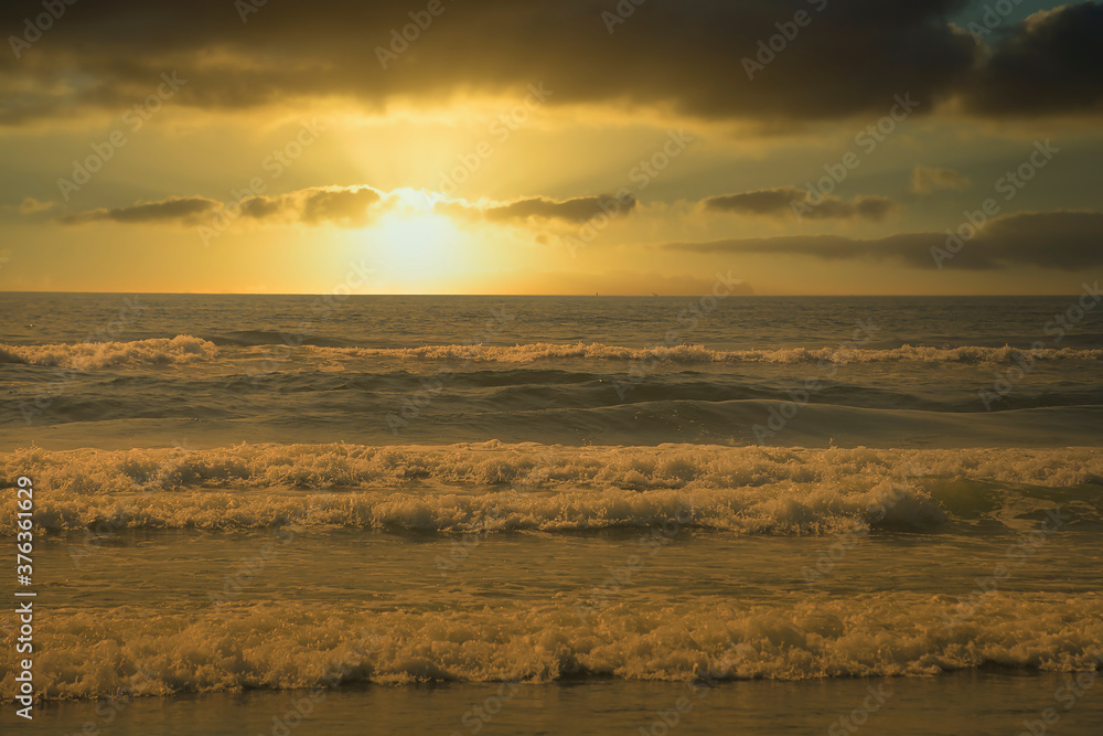 2020-09-06 WAVES CRASHING ON THE SHORE DURING A SUNSET WITH DARK CLOUDS 2020-09-06 WAVES CRASHING ON THE SHORE DURING A SUNSET WITH DARK CLOUDS