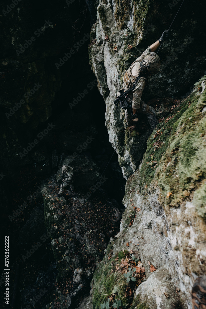 Fototapeta premium Soldier on the rocks