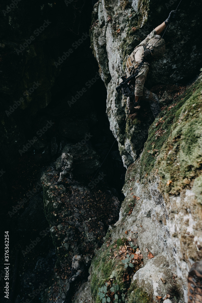 Fototapeta premium Soldier on the rocks