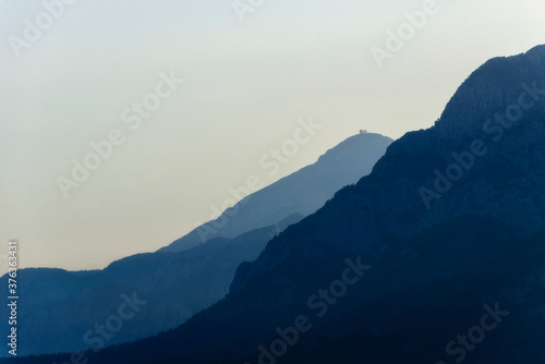 Beautiful landscape of blue mountains layers during sunset