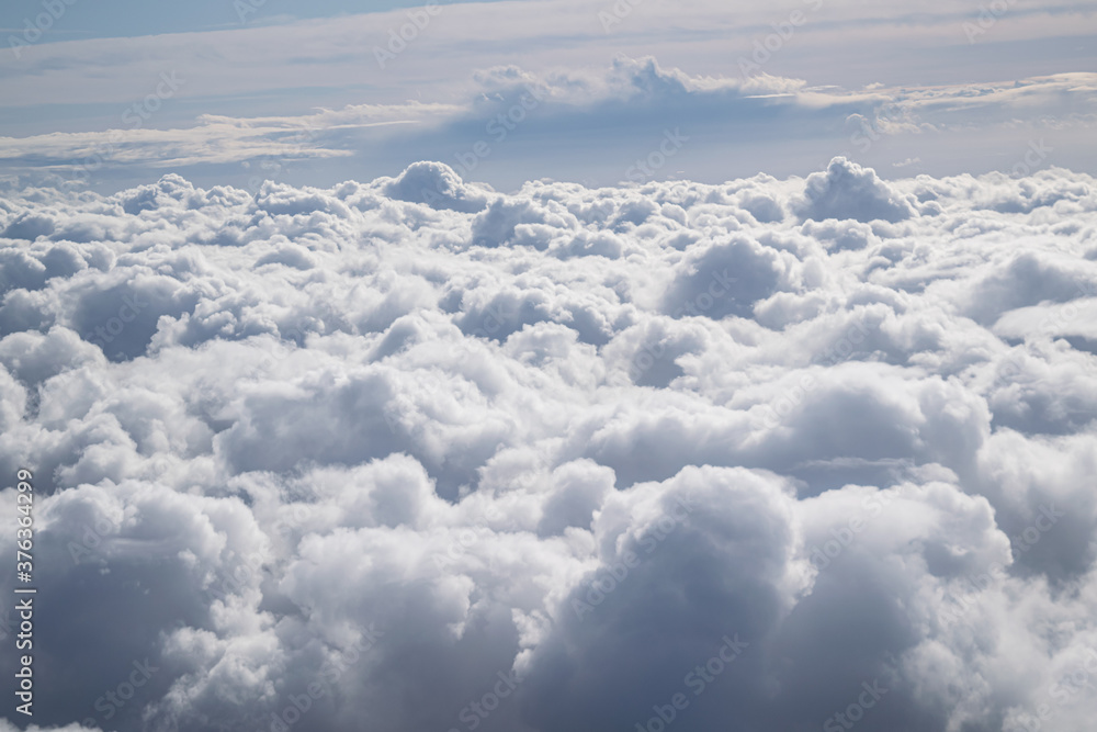 above the clouds on cloud 9 in a plane above the clouds on cloud 9 in a plane