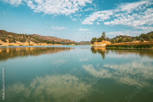 Santa Margarita Lake, California. Beautiful lakeshore and cloudy sky on background