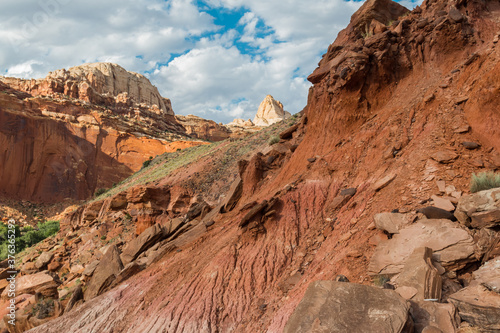 The Red Sandstone Cliffs of The Waterpocket Fold with Pectols Pyramid in The Distance, Capitol Reef National Park, Utah, USA