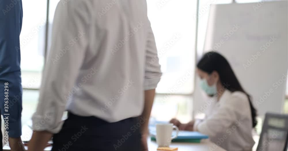 Business asian man shaking hands each other reached a business agreement Business asian man shaking hands each other reached a business agreement