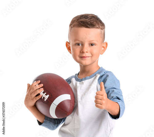 Little boy with rugby ball ...