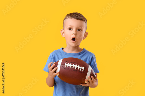 Surprised little boy with r...