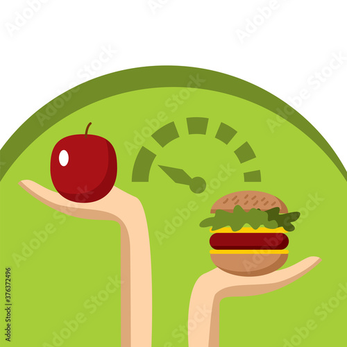 Two hands weigh an apple and a cheeseburger. Proper nutrition, health care, diet.