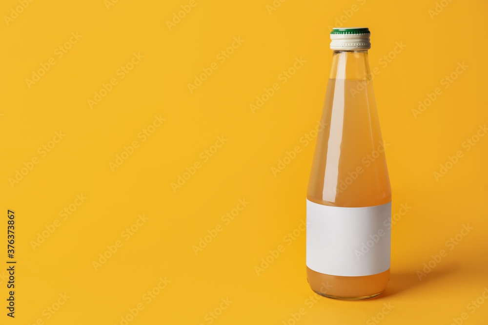 Bottle of juice on color background Bottle of juice on color background