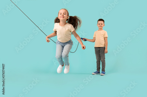 Cute little children jumpin...
